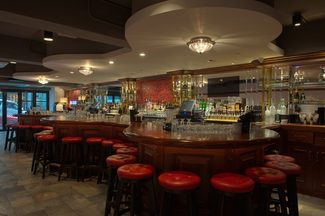 The velvety red bar area