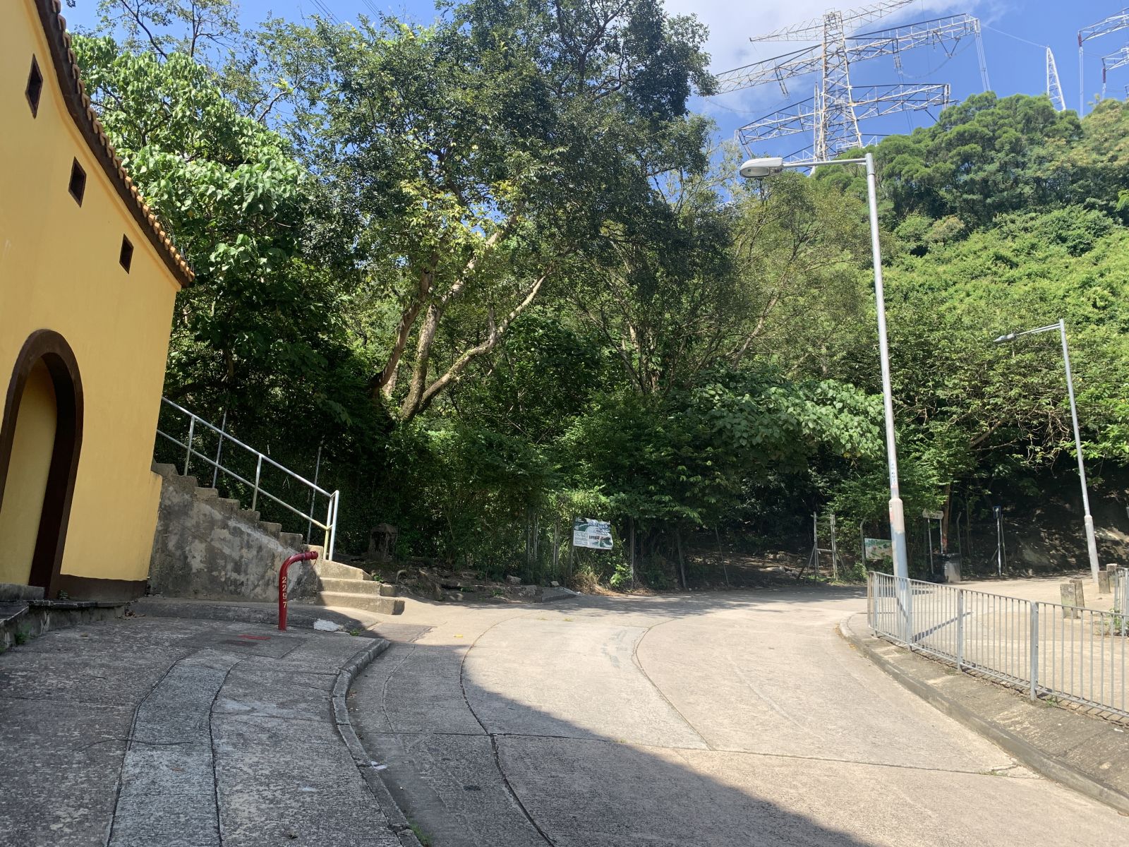 Turn right and walk along the main road