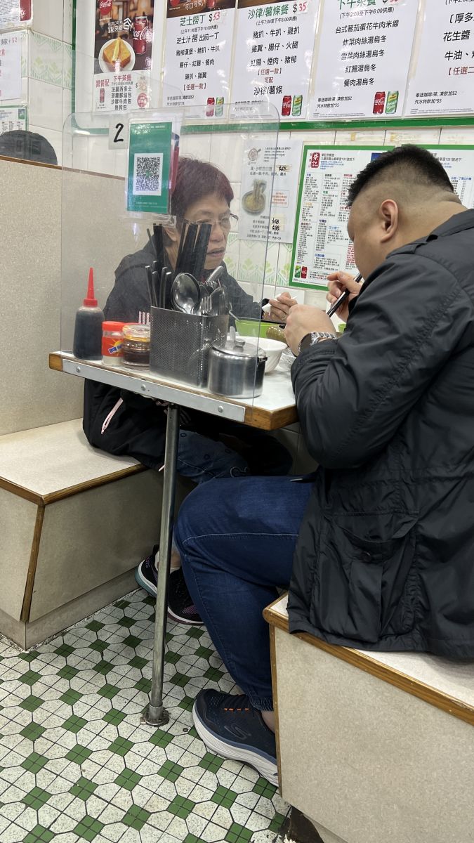 People eating Wing kee