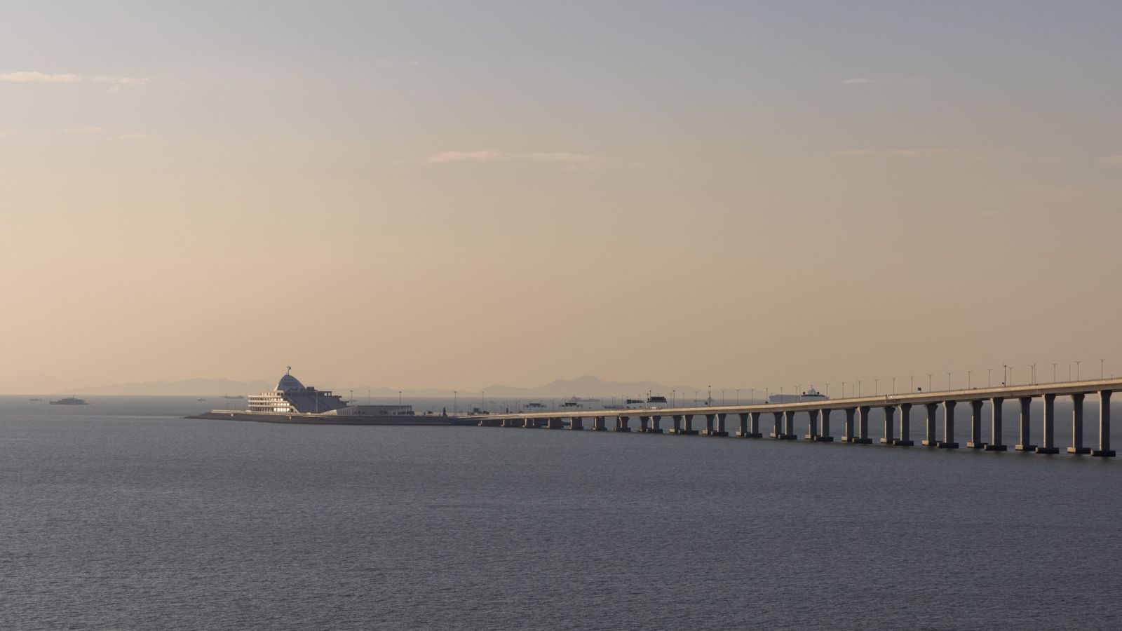 Hong Kong-Macau-Zhuhai bridge under sunset